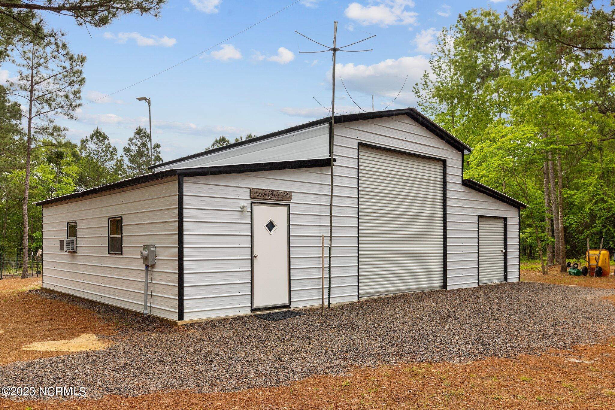 7000 Nc-22 Carthage, NC 28327 - Photo 28 of 35 Huge Outbuilding with Workshop and Retreat