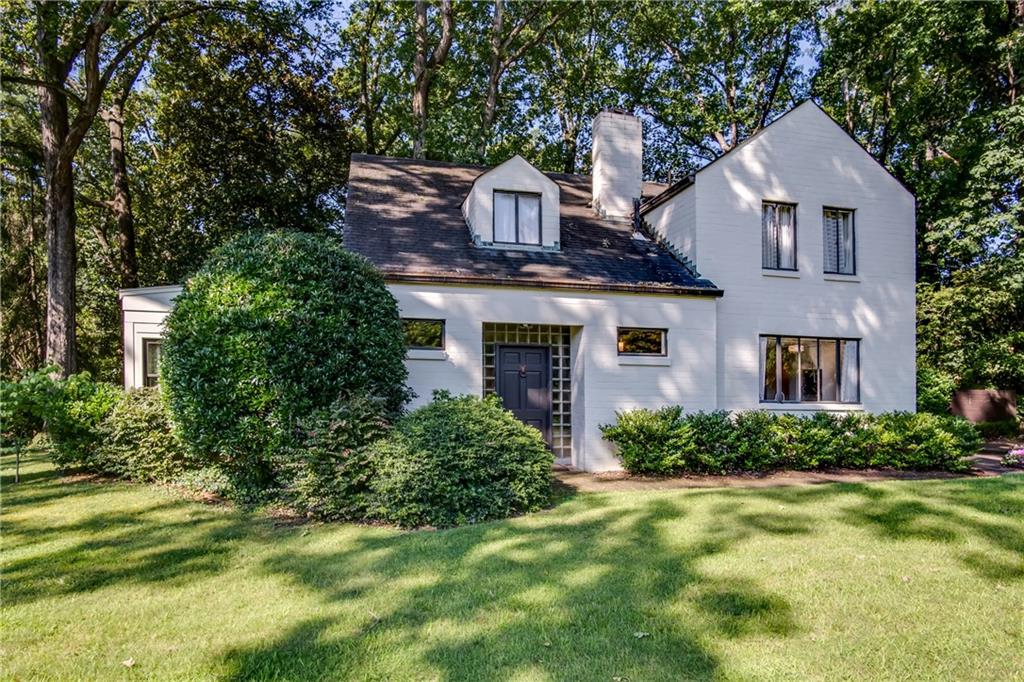 3566 Cantrell Road Northeast Atlanta, GA 30319 - Photo 1 of 1 a front view of a house with a yard