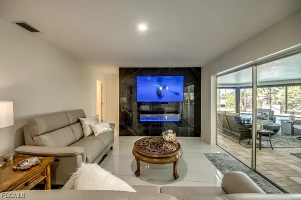 a bathroom with a toilet a sink a vanity and mirror