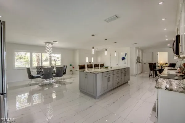 an aerial view of houses with outdoor space