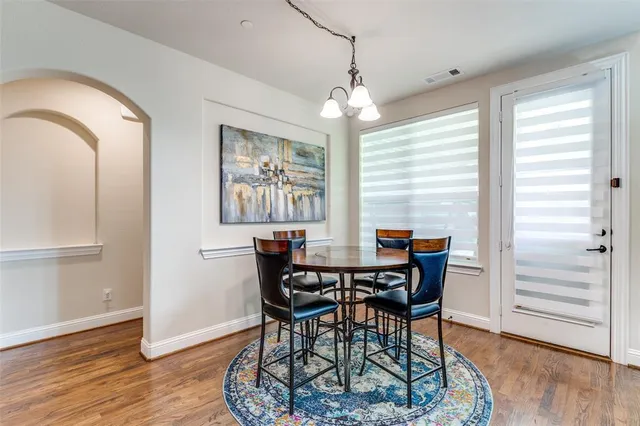 a kitchen with stainless steel appliances granite countertop a sink refrigerator and microwave