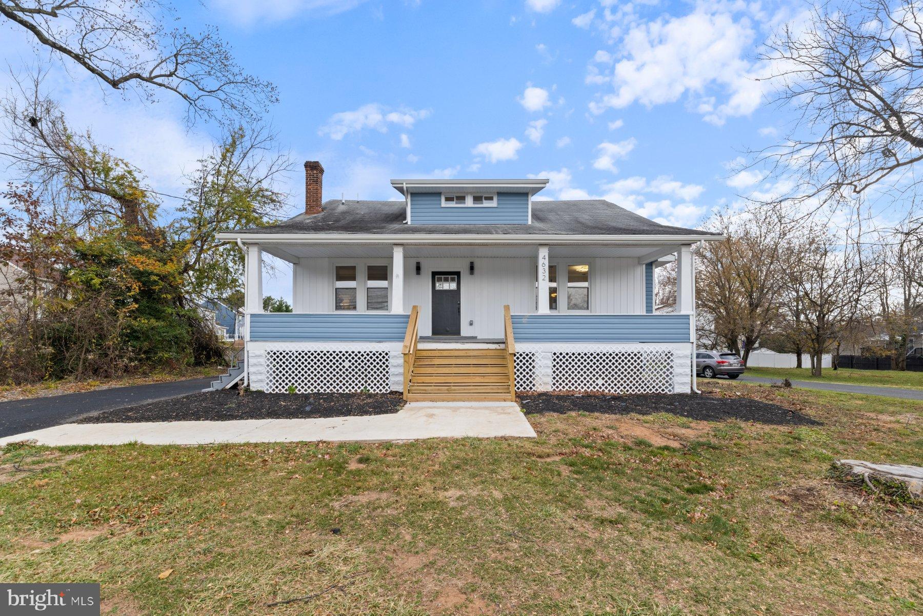 4632 Old Court Road Pikesville, MD 21208 - Photo 1 of 34 a front view of a house with a yard