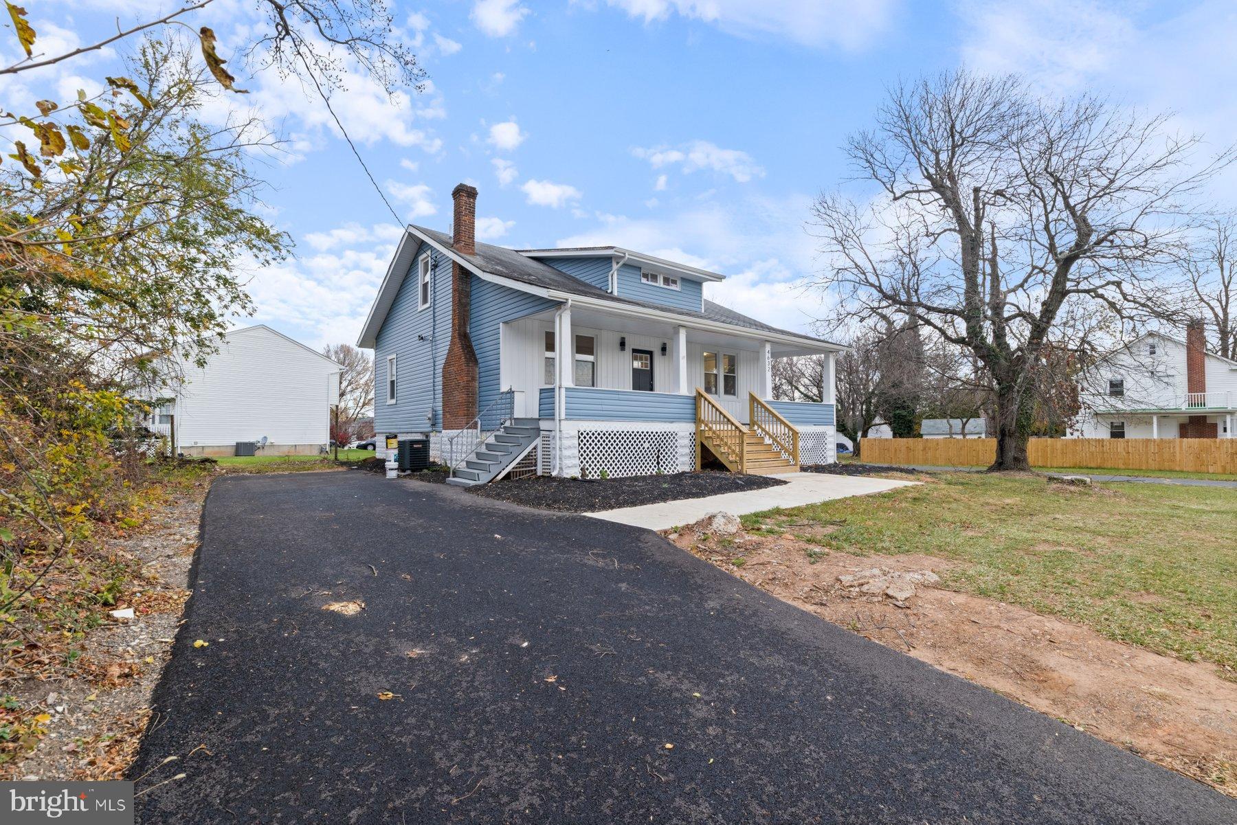 4632 Old Court Road Pikesville, MD 21208 - Photo 29 of 34 a view of a house with a yard