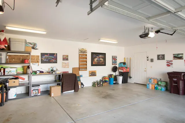 a view of a livingroom with furniture and toys