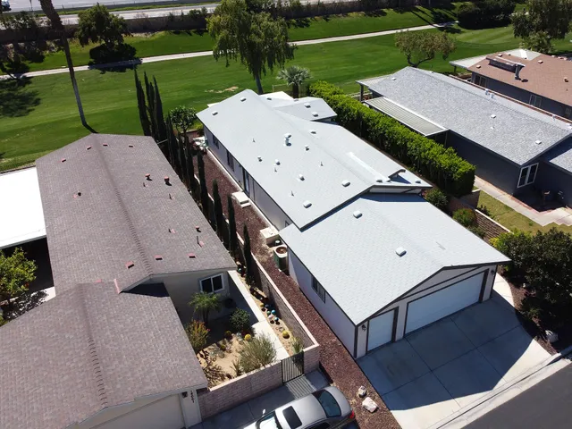 an aerial view of a house having yard