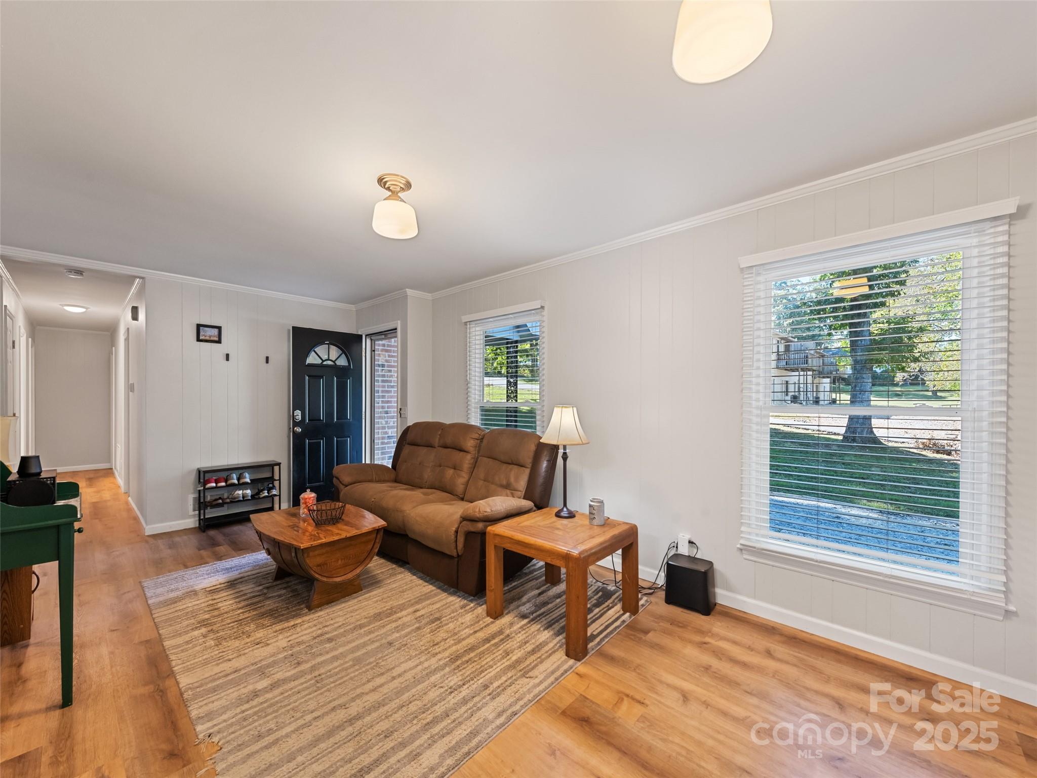 263 Blanton Street Columbus, NC 28722 - Photo 12 of 45 a living room with furniture and a window