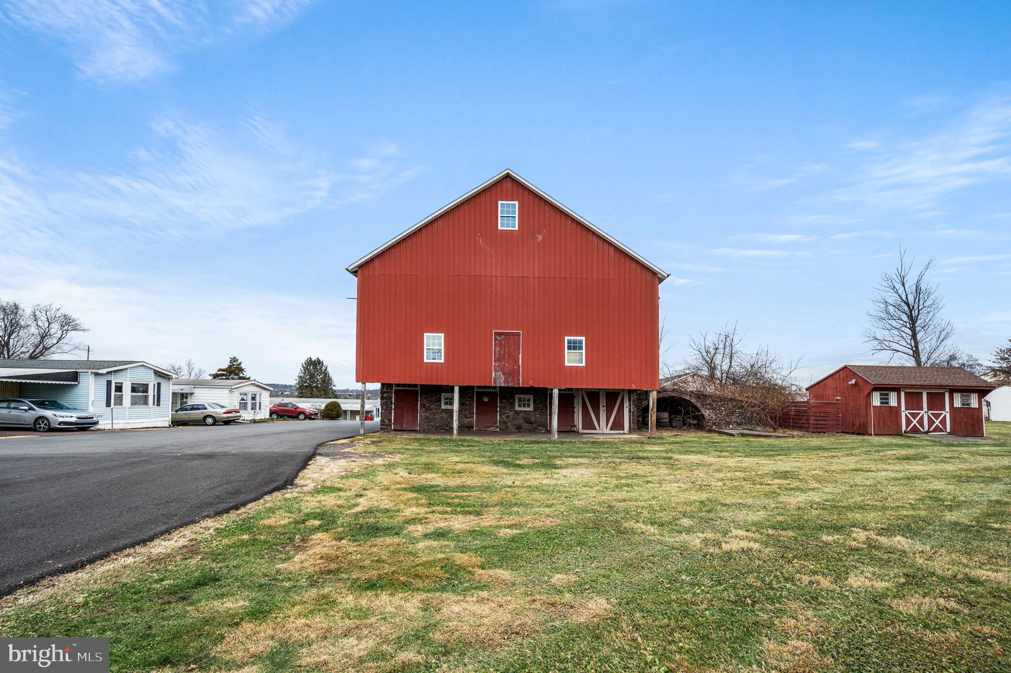 2933 East High Street Pottstown, PA 19464 - Photo 12 of 22 a view of a house with swimming pool and a yard