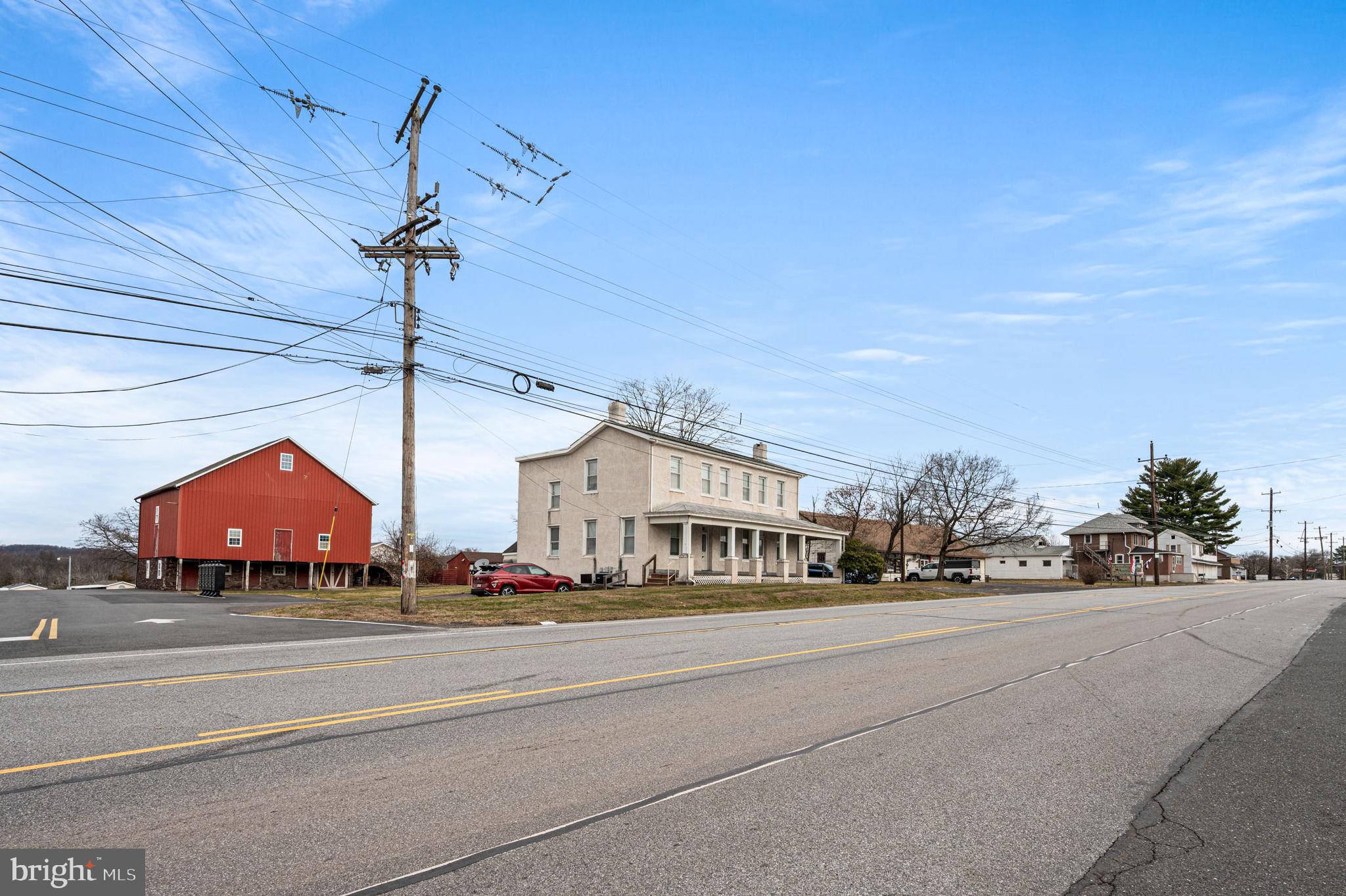 2933 East High Street Pottstown, PA 19464 - Photo 2 of 22 a car parked on the side of the road