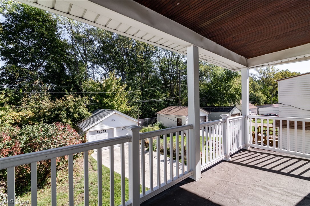 3839 Silsby Road Cleveland, OH 44111 - Photo 21 of 34 A door in the bathroom leads to this spacious covered deck overlooking the back yard.