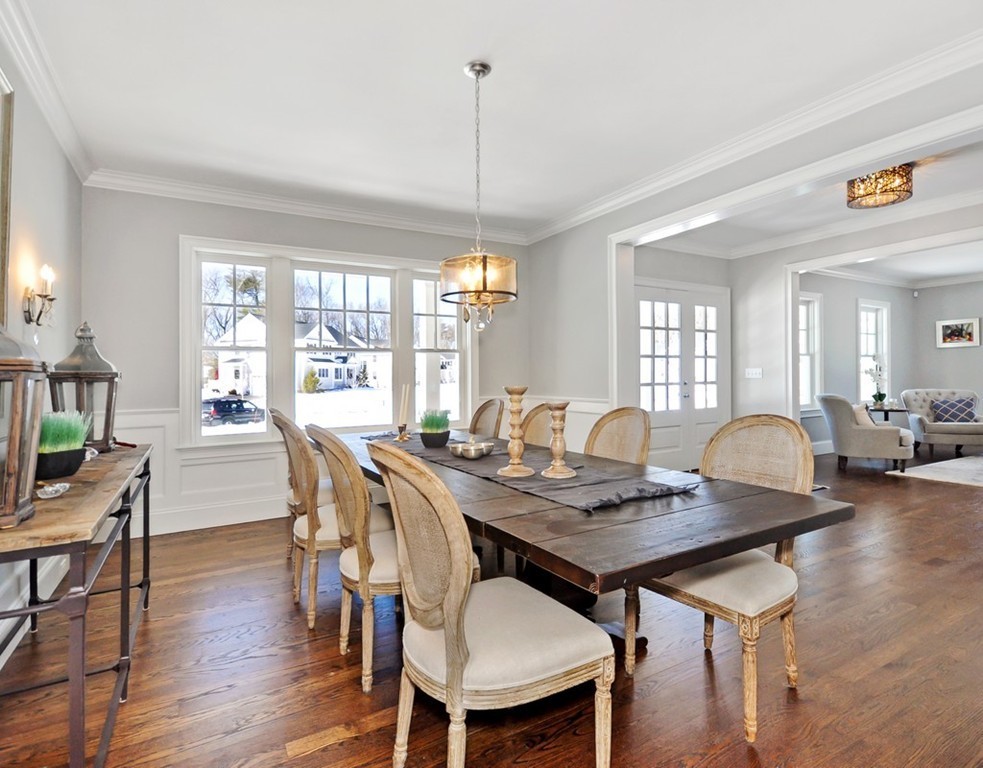 291 Monsen Road Concord, MA 01742 - Photo 11 of 26 a view of a dining room with furniture window and wooden floor
