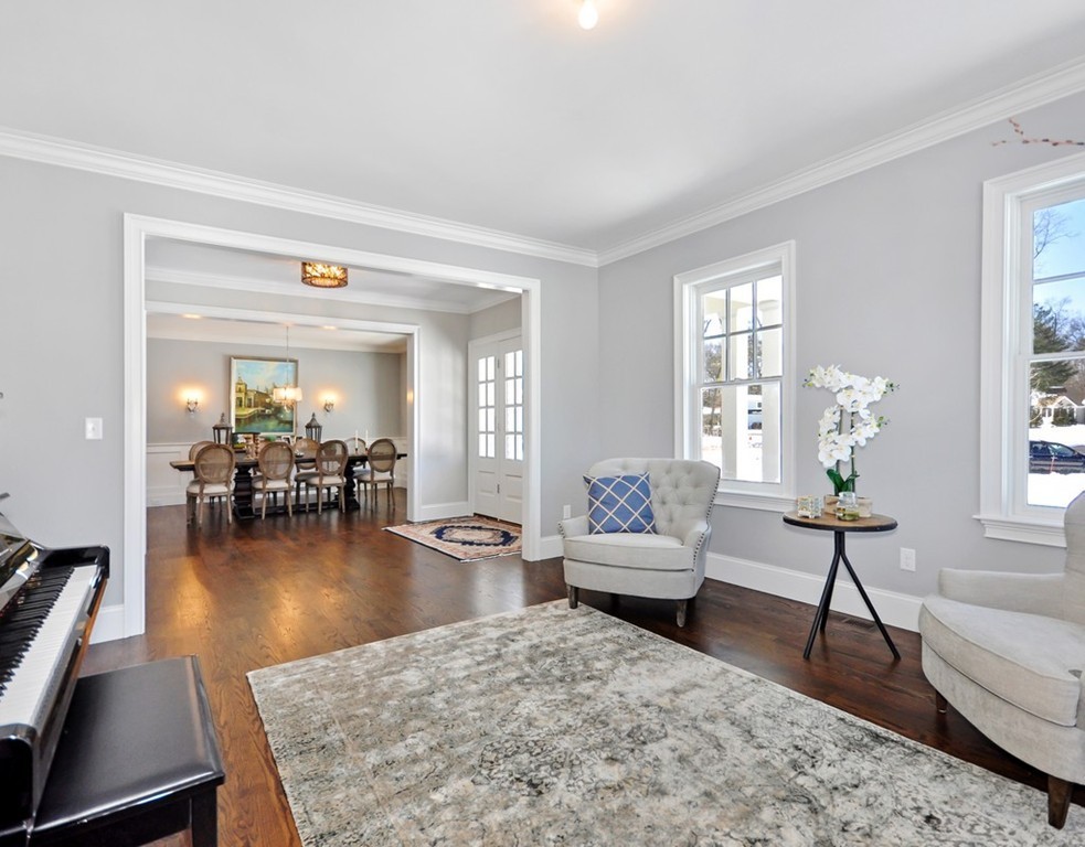 291 Monsen Road Concord, MA 01742 - Photo 12 of 26 a living room with furniture and a wooden floor