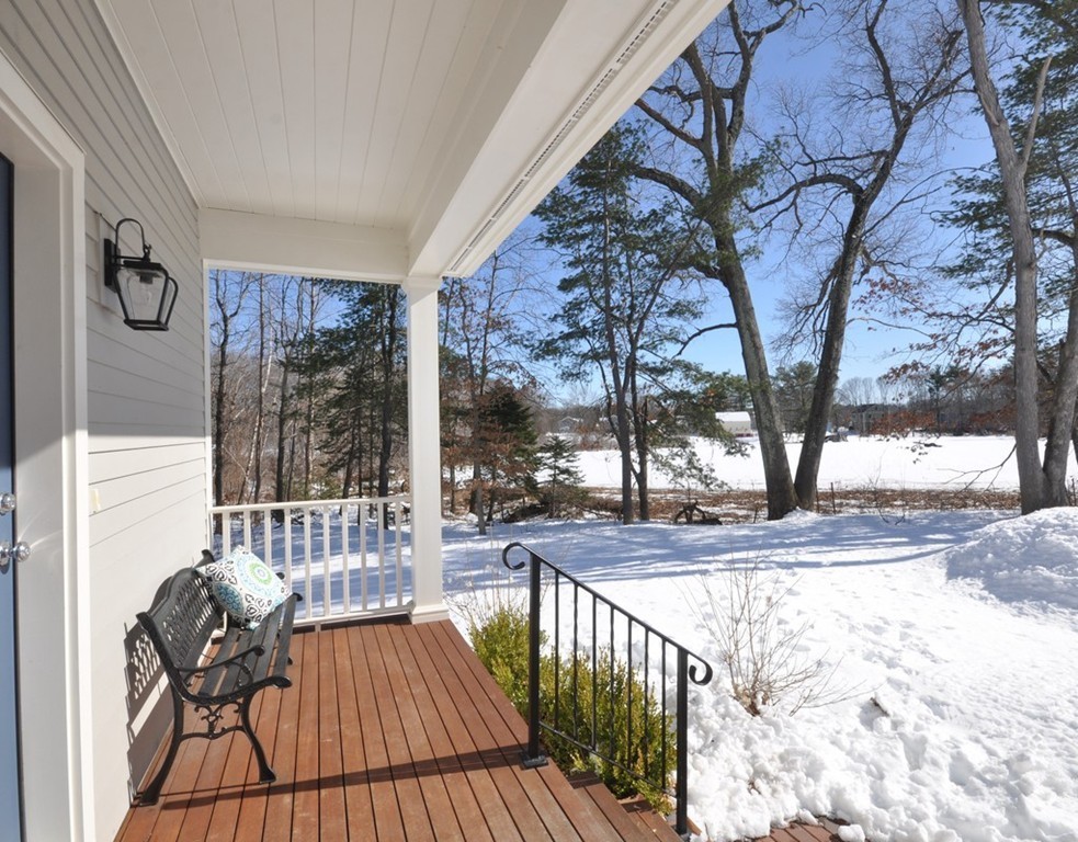 291 Monsen Road Concord, MA 01742 - Photo 24 of 26 a view of a porch with furniture and garden