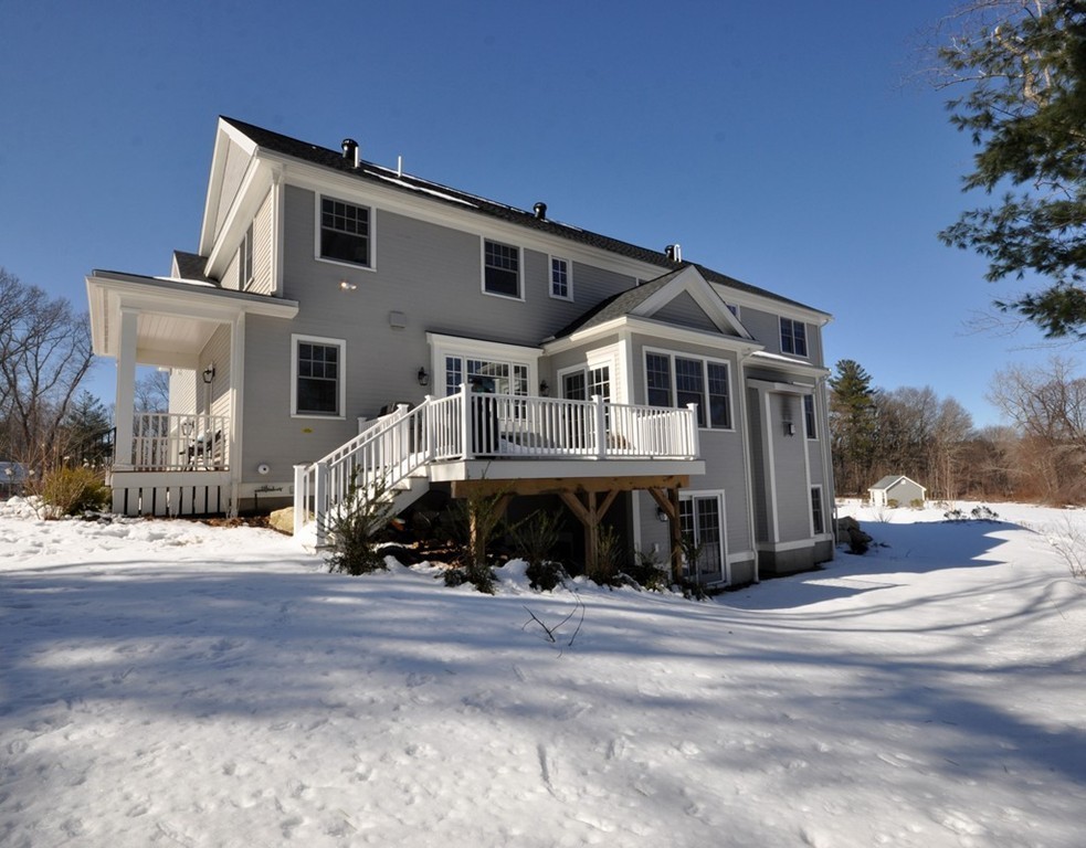 291 Monsen Road Concord, MA 01742 - Photo 25 of 26 a front view of a house with a yard