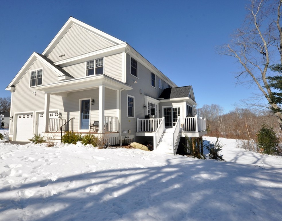 291 Monsen Road Concord, MA 01742 - Photo 26 of 26 a view of a house with snow on the wall