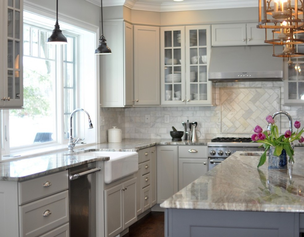 291 Monsen Road Concord, MA 01742 - Photo 4 of 26 a kitchen with sink cabinets and window