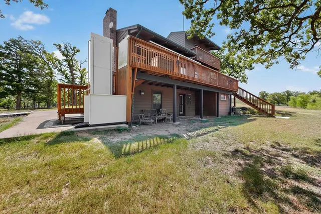 a view of a house with swimming pool
