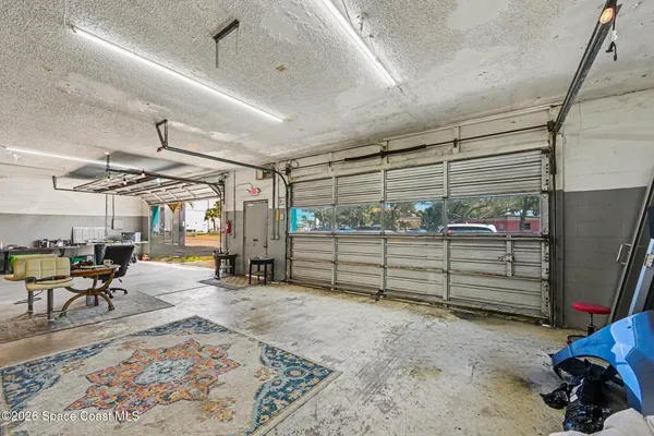 a view of a garage with furniture