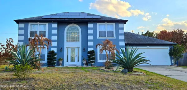 a view of a house with roof deck