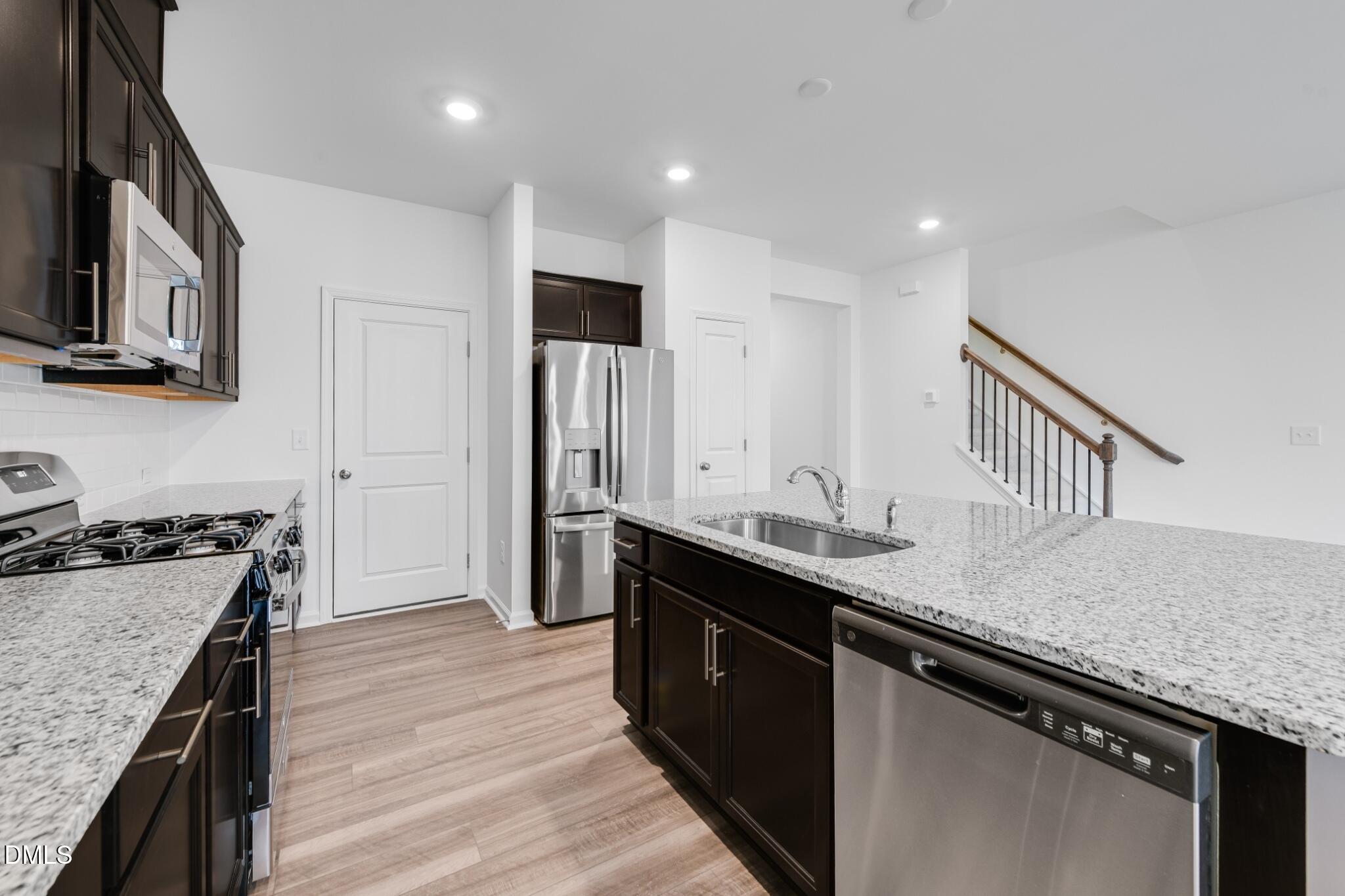 127 Tree Moss Court Rolesville, NC 27571 - Photo 7 of 30 SUN_ParkerRidge_Pic_CarsonII_QMI_30_Kitc