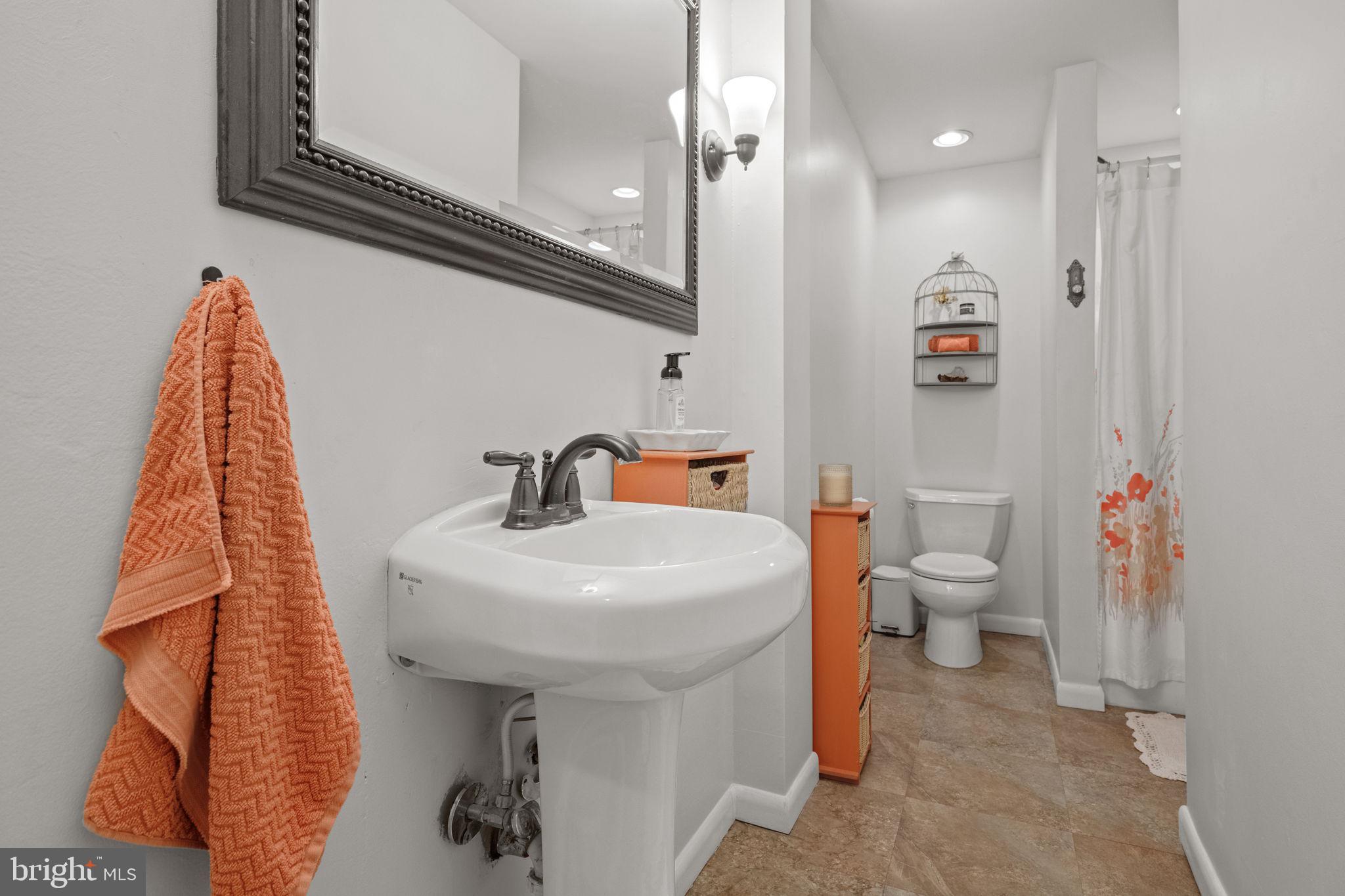 1818 Longview Drive Lancaster, PA 17601 - Photo 27 of 49 a bathroom with a sink toilet and shower