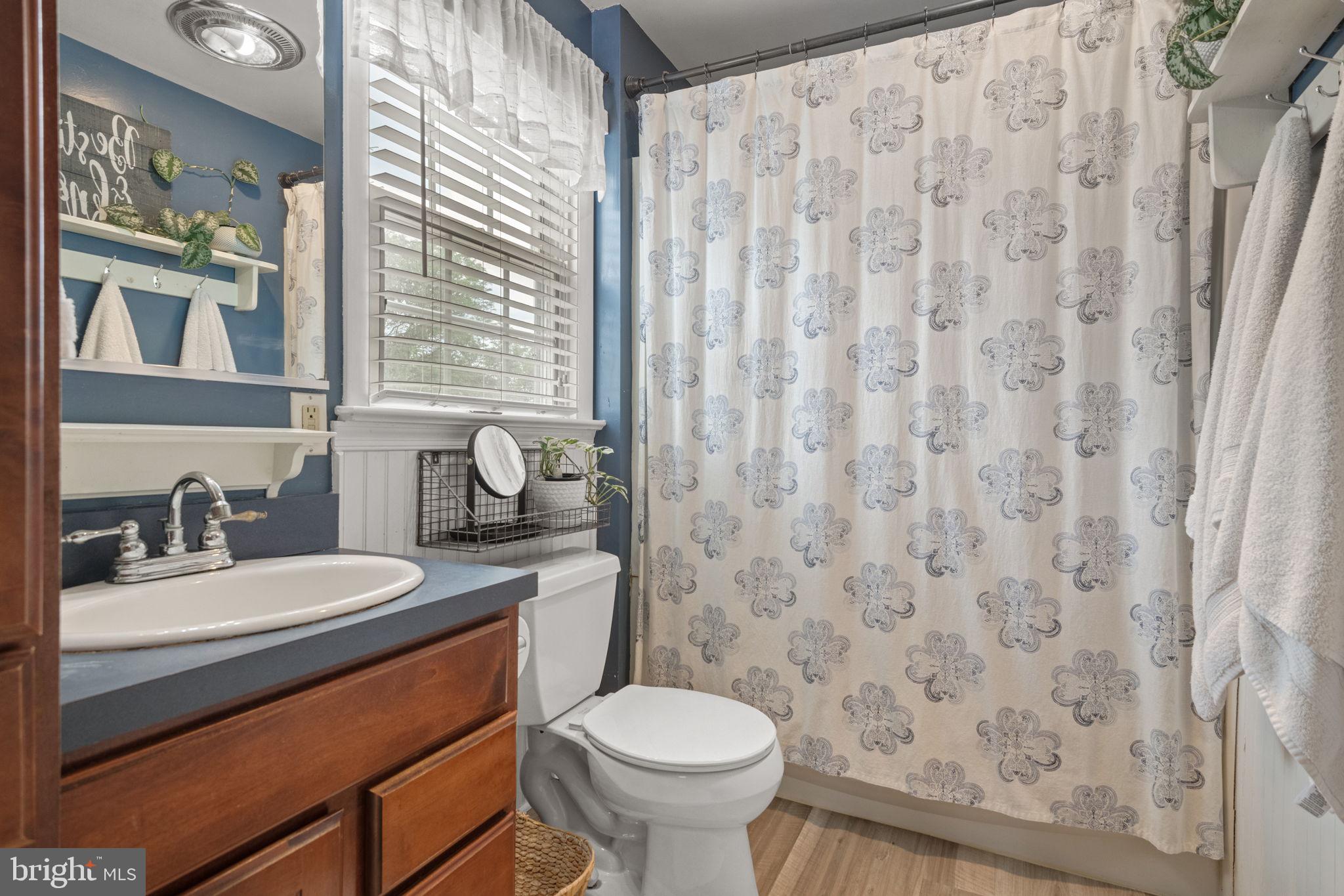 1818 Longview Drive Lancaster, PA 17601 - Photo 34 of 49 a bathroom with a toilet sink and mirror