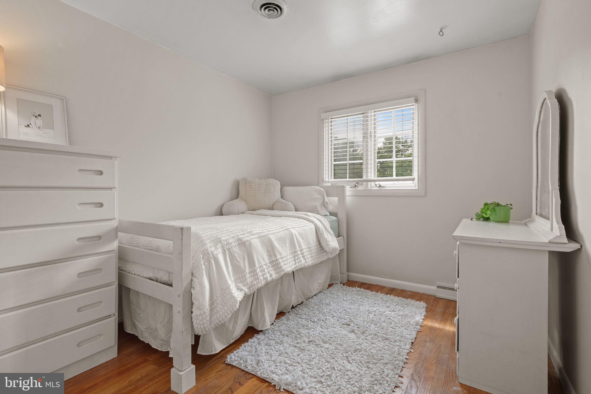 1818 Longview Drive Lancaster, PA 17601 - Photo 37 of 49 a bedroom with a bed and a window