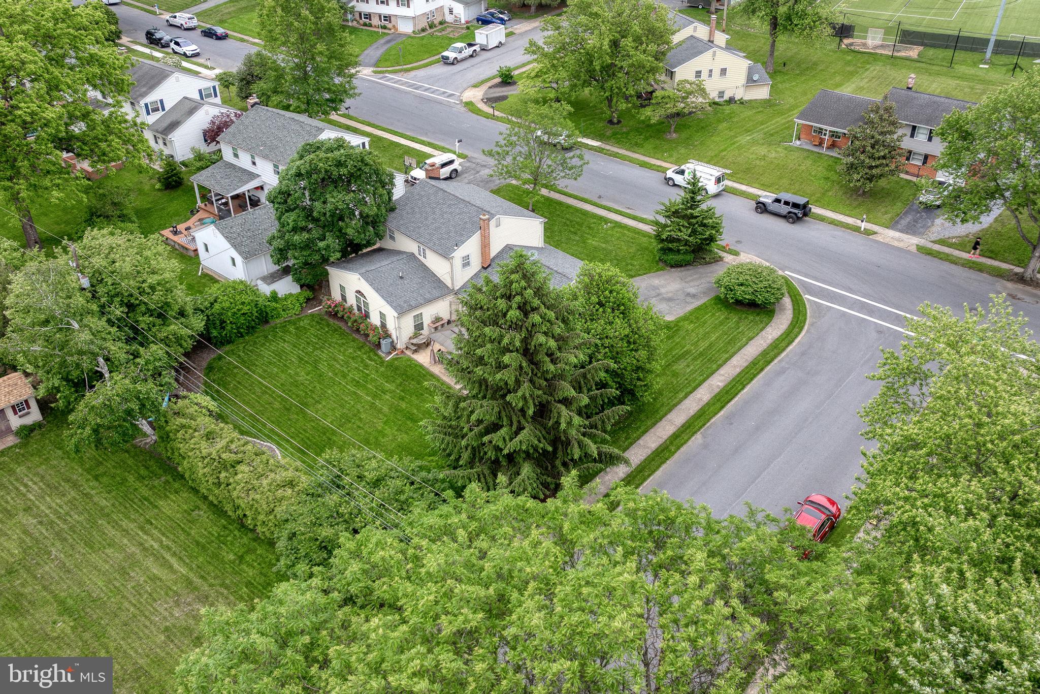 1818 Longview Drive Lancaster, PA 17601 - Photo 48 of 49 an aerial view of residential house with outdoor space and trees all around