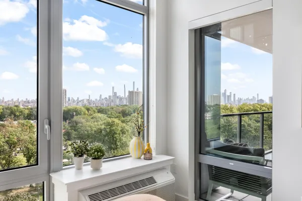 a view of a glass door and a window