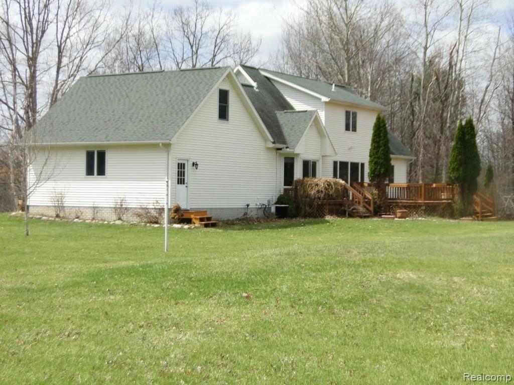 1483 Dockham Road Columbiaville, MI 48421 - Photo 31 of 38 Back Side.jpg