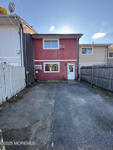 a view of a house with a street