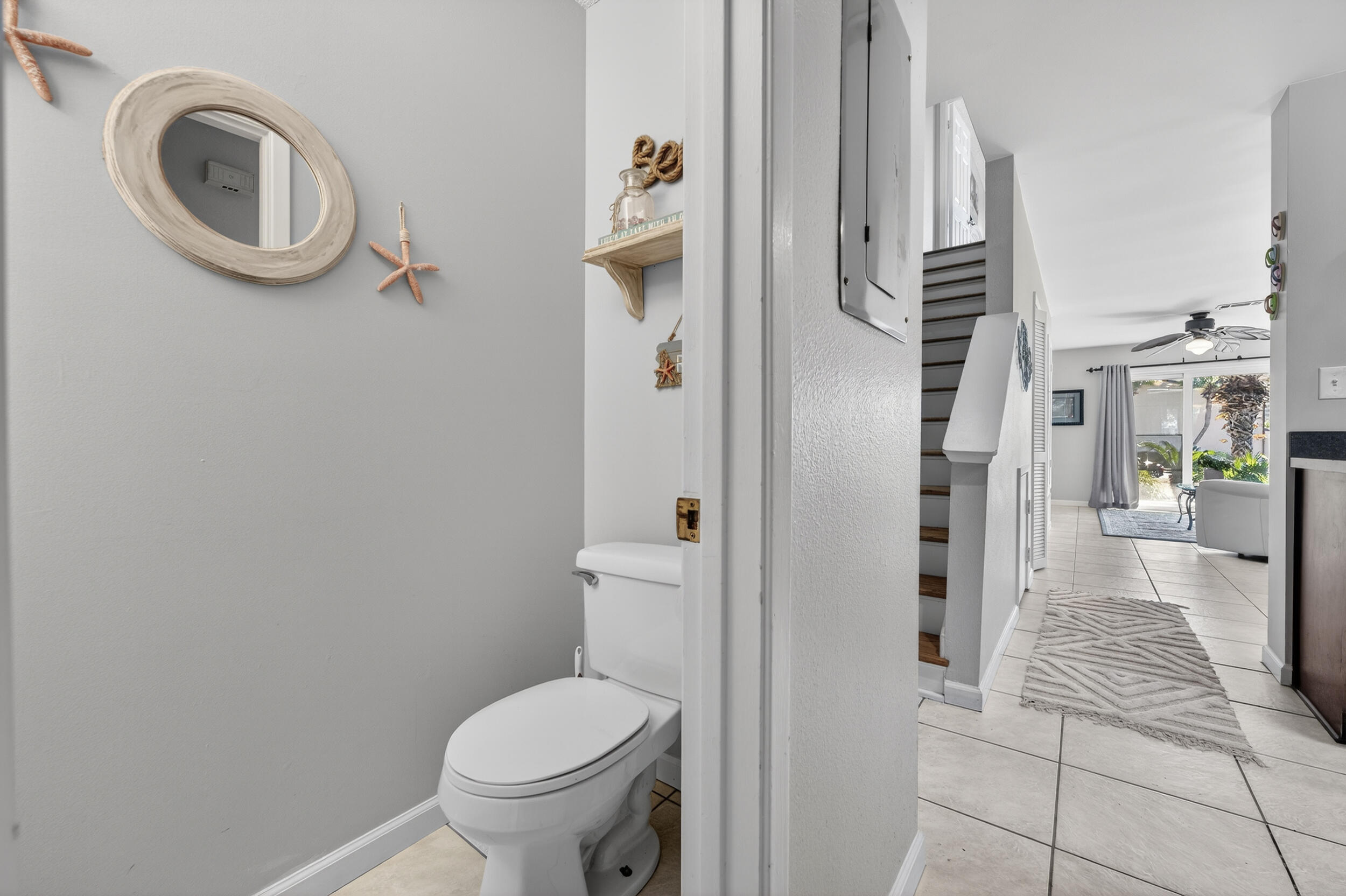 17620 Front Beach Road, Unit BB6 Panama City Beach, FL 32413 - Photo 17 of 47 a bathroom with a toilet and a shower