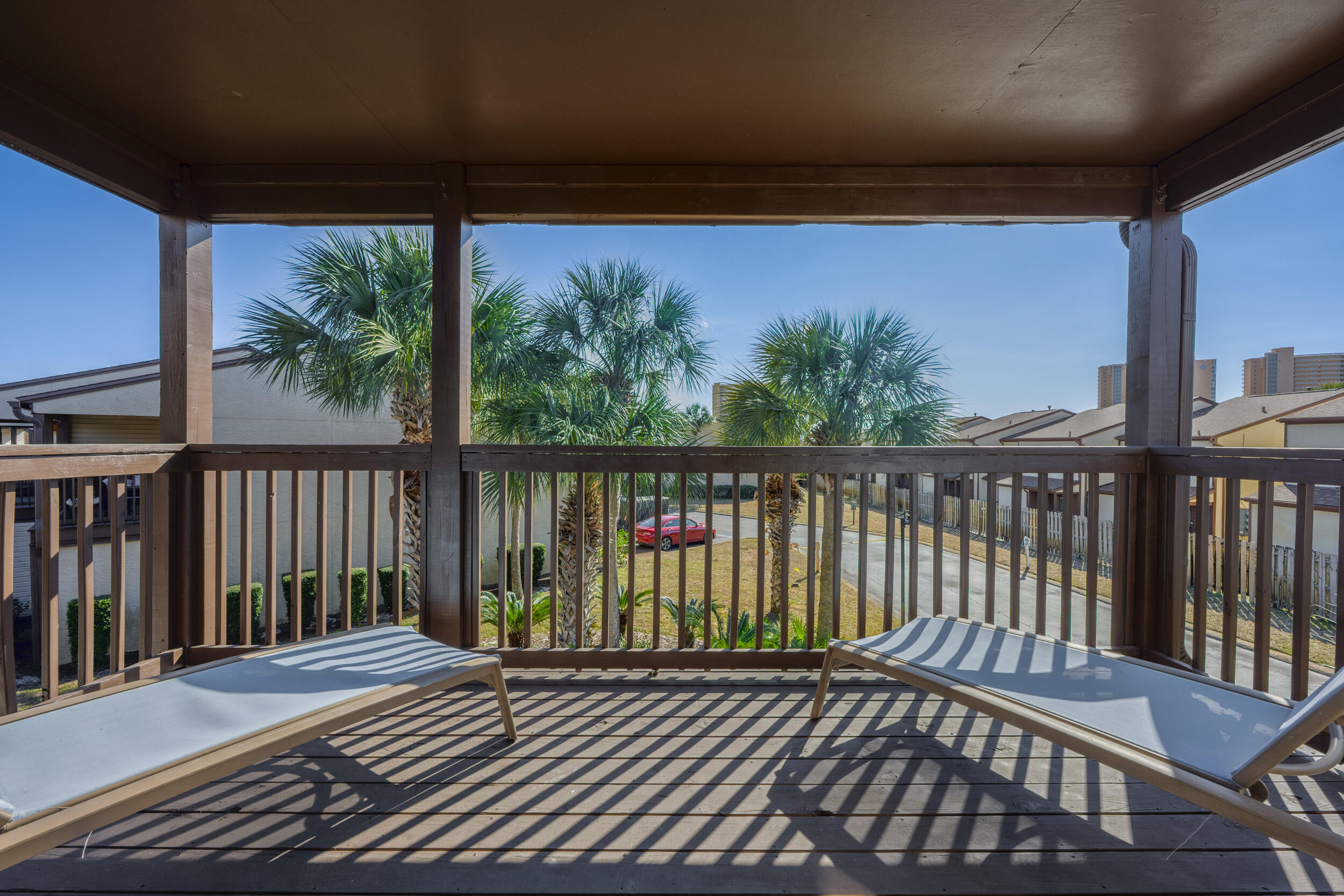 17620 Front Beach Road, Unit BB6 Panama City Beach, FL 32413 - Photo 25 of 47 a view of a balcony with wooden floor
