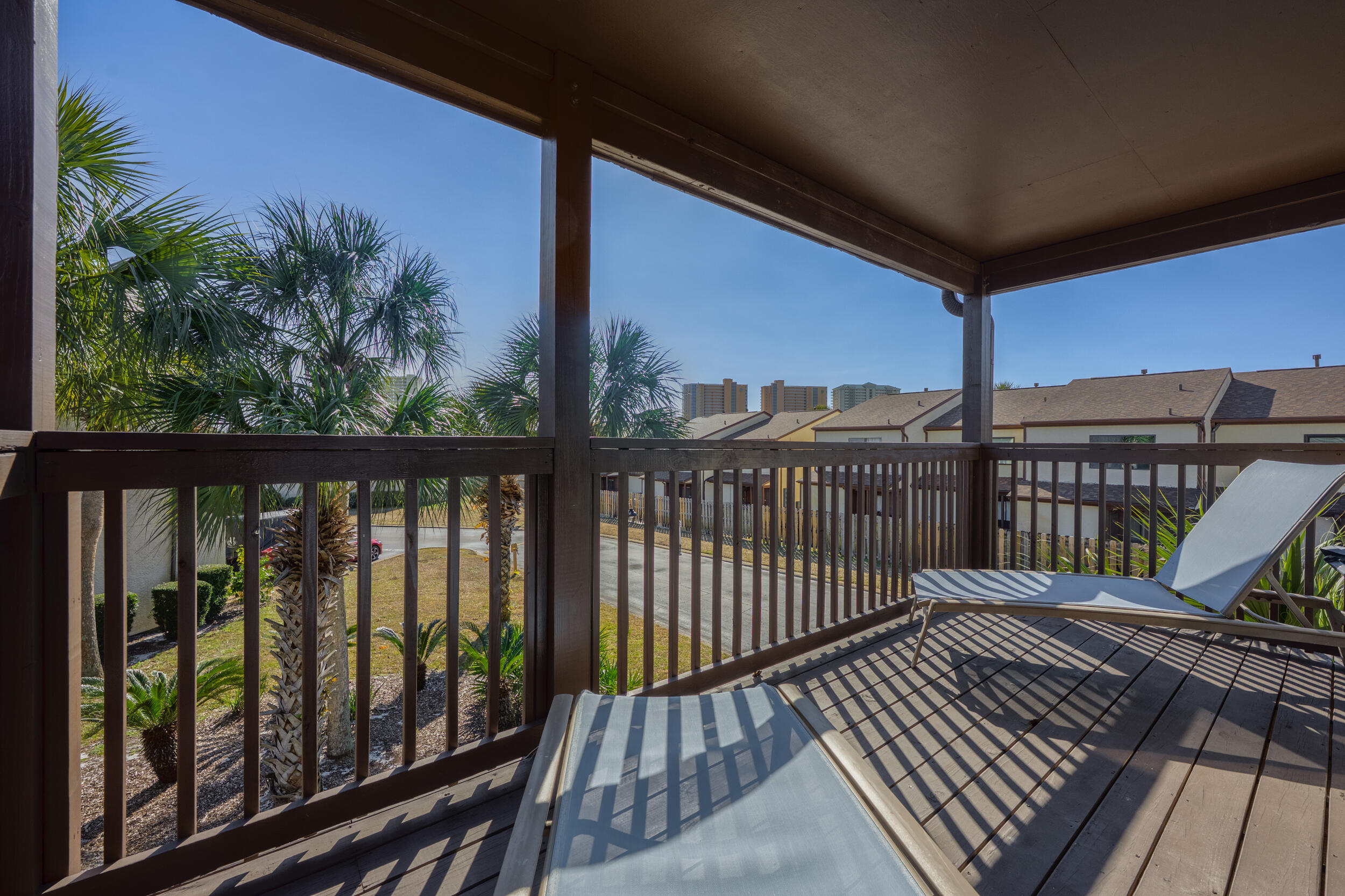 17620 Front Beach Road, Unit BB6 Panama City Beach, FL 32413 - Photo 27 of 47 a view of a balcony with wooden floor