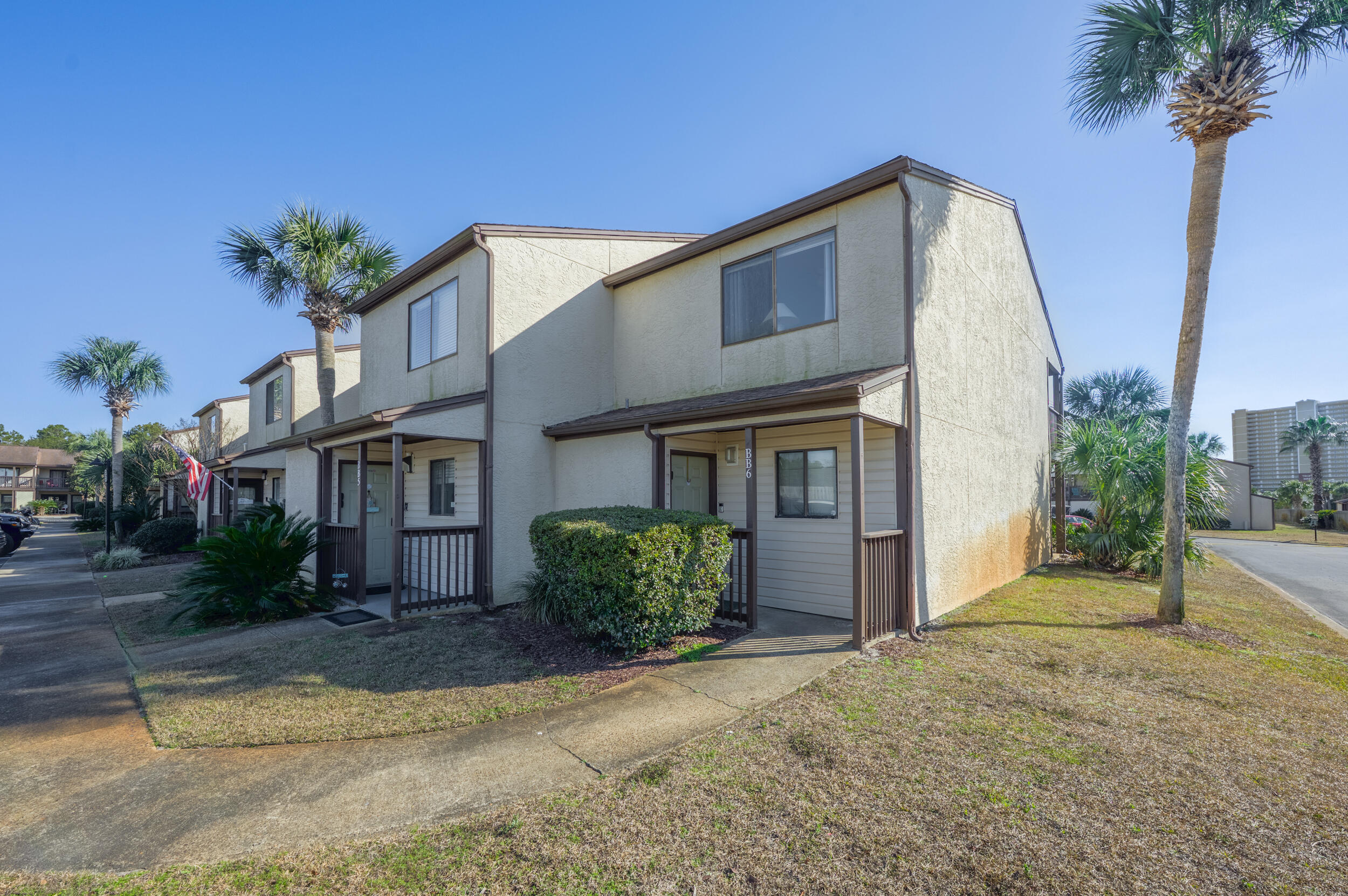 17620 Front Beach Road, Unit BB6 Panama City Beach, FL 32413 - Photo 3 of 47 a front view of a house with garden