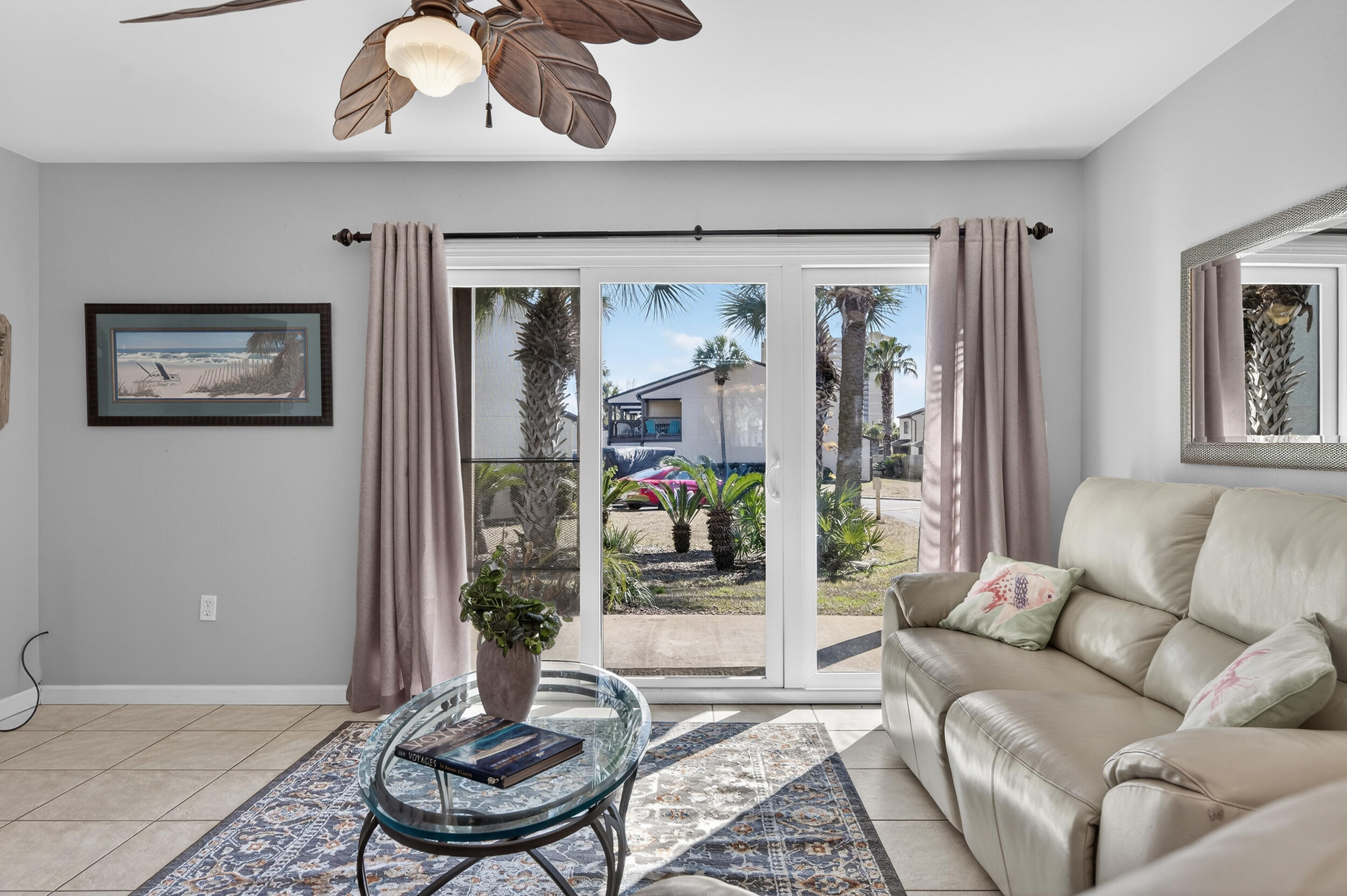 17620 Front Beach Road, Unit BB6 Panama City Beach, FL 32413 - Photo 6 of 47 a living room with furniture and a large window