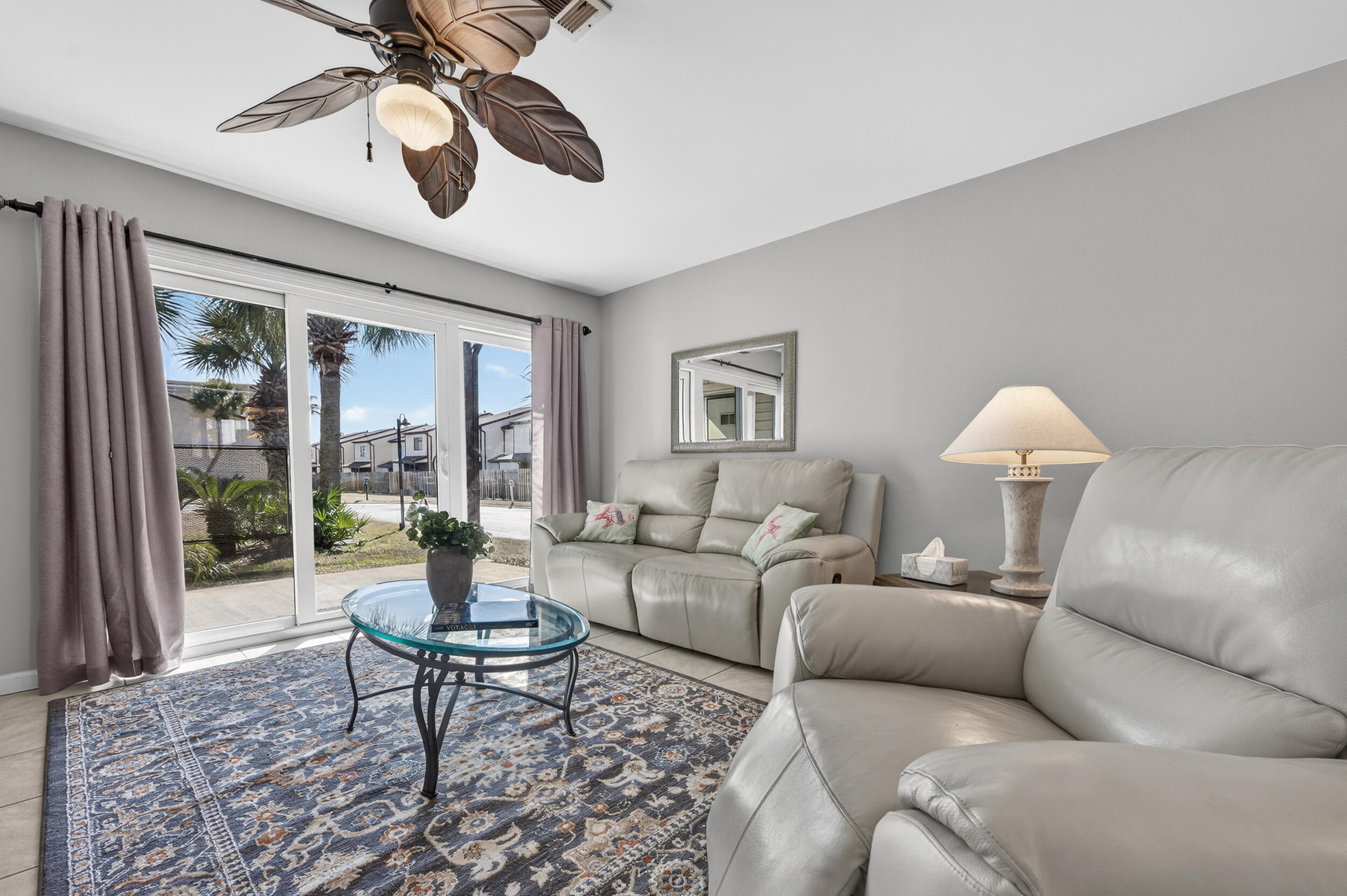 17620 Front Beach Road, Unit BB6 Panama City Beach, FL 32413 - Photo 7 of 47 a living room with furniture and a large window