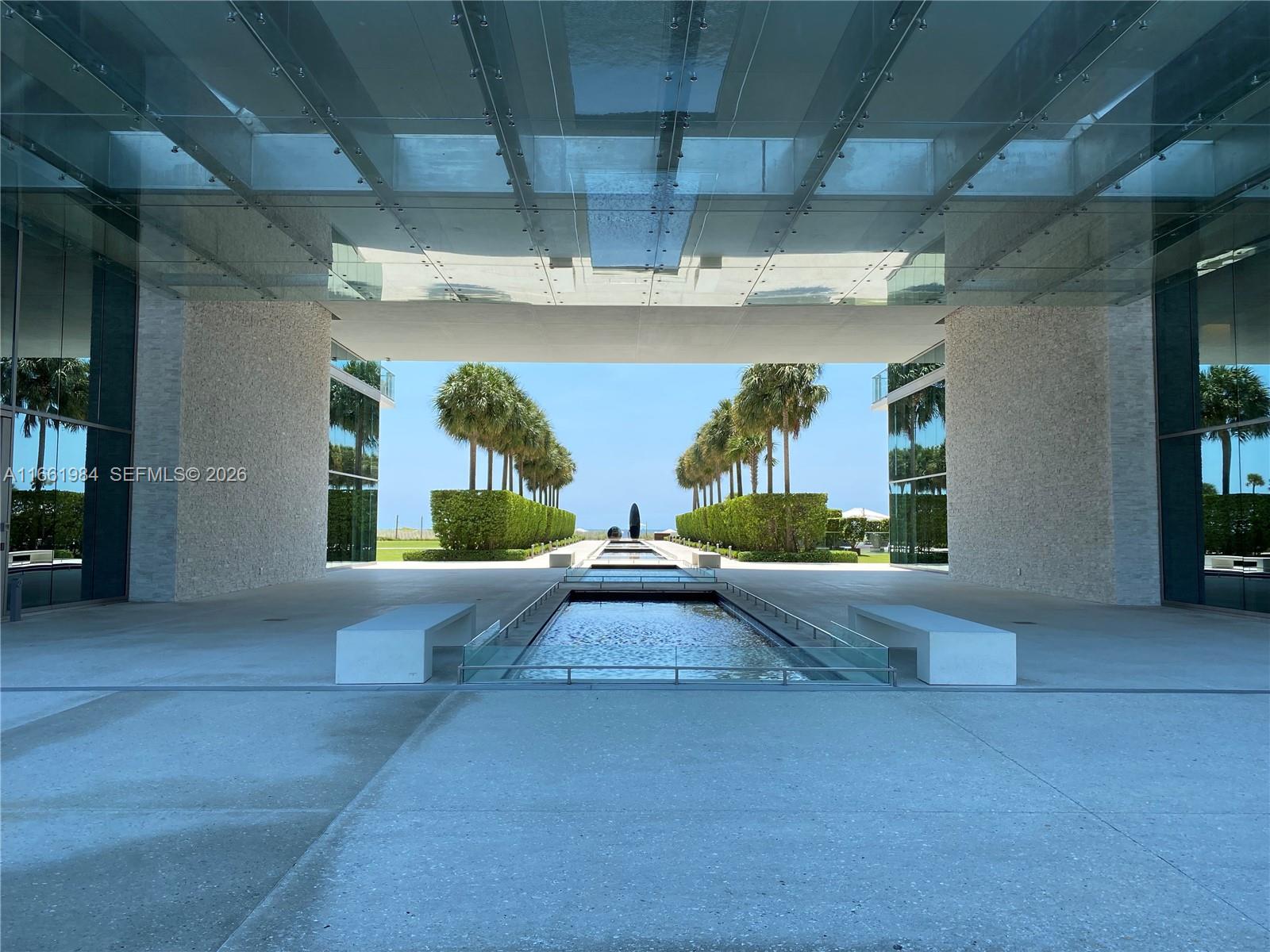 350 Ocean Drive, Unit 406N Key Biscayne, FL 33149 - Photo 35 of 38 a view of swimming pool with outdoor seating