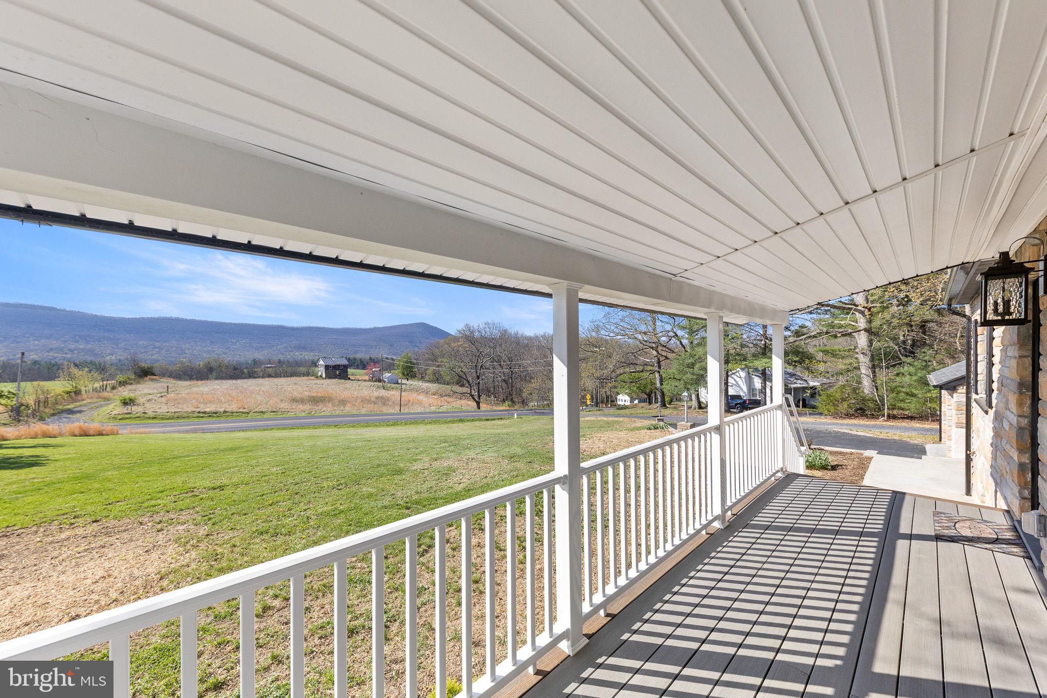 673 Fort Valley Road Fort Valley, VA 22652 - Photo 5 of 35 Covered front porch with mountain views