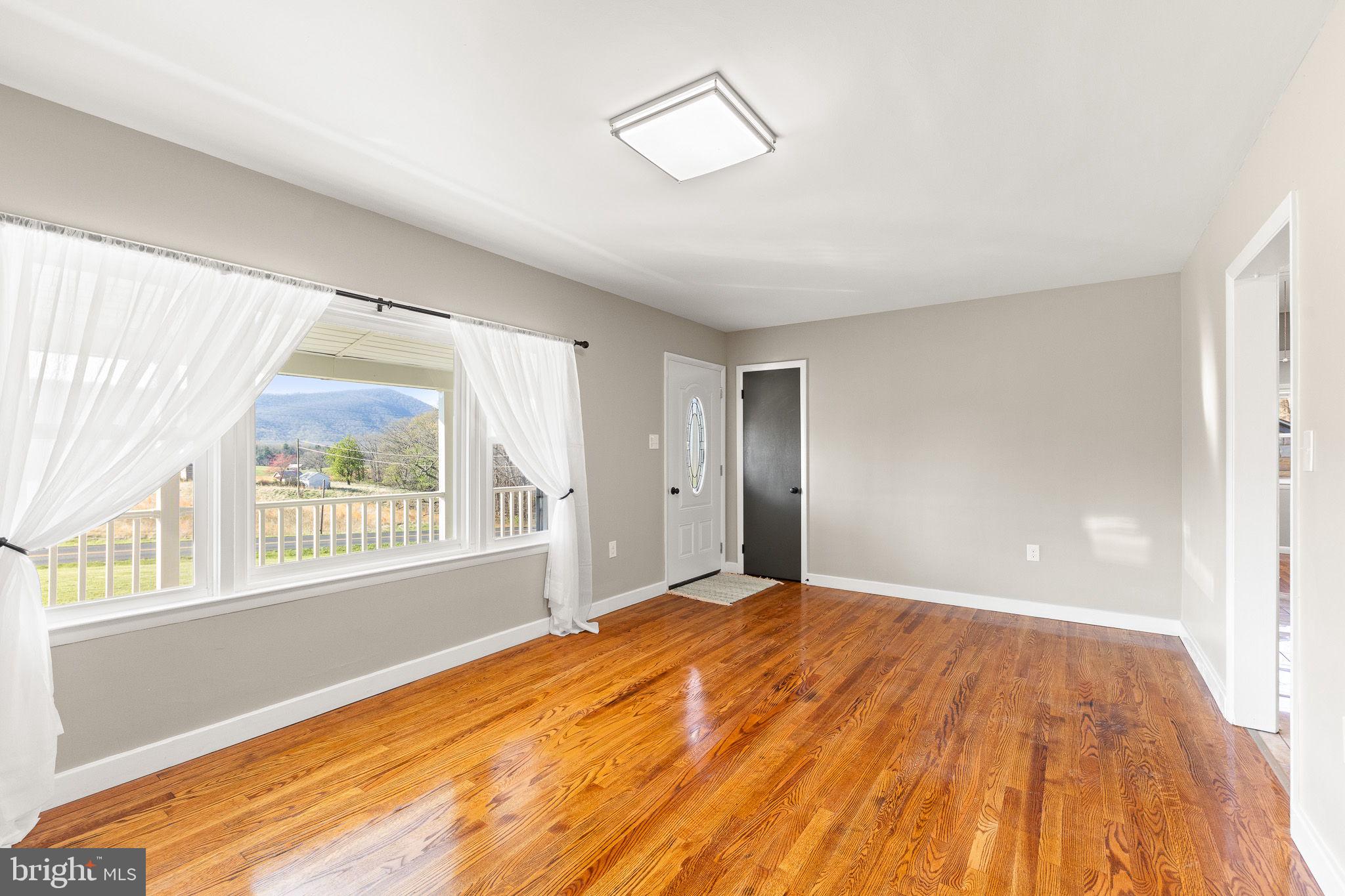 673 Fort Valley Road Fort Valley, VA 22652 - Photo 6 of 35 Living Room with hardwood floors