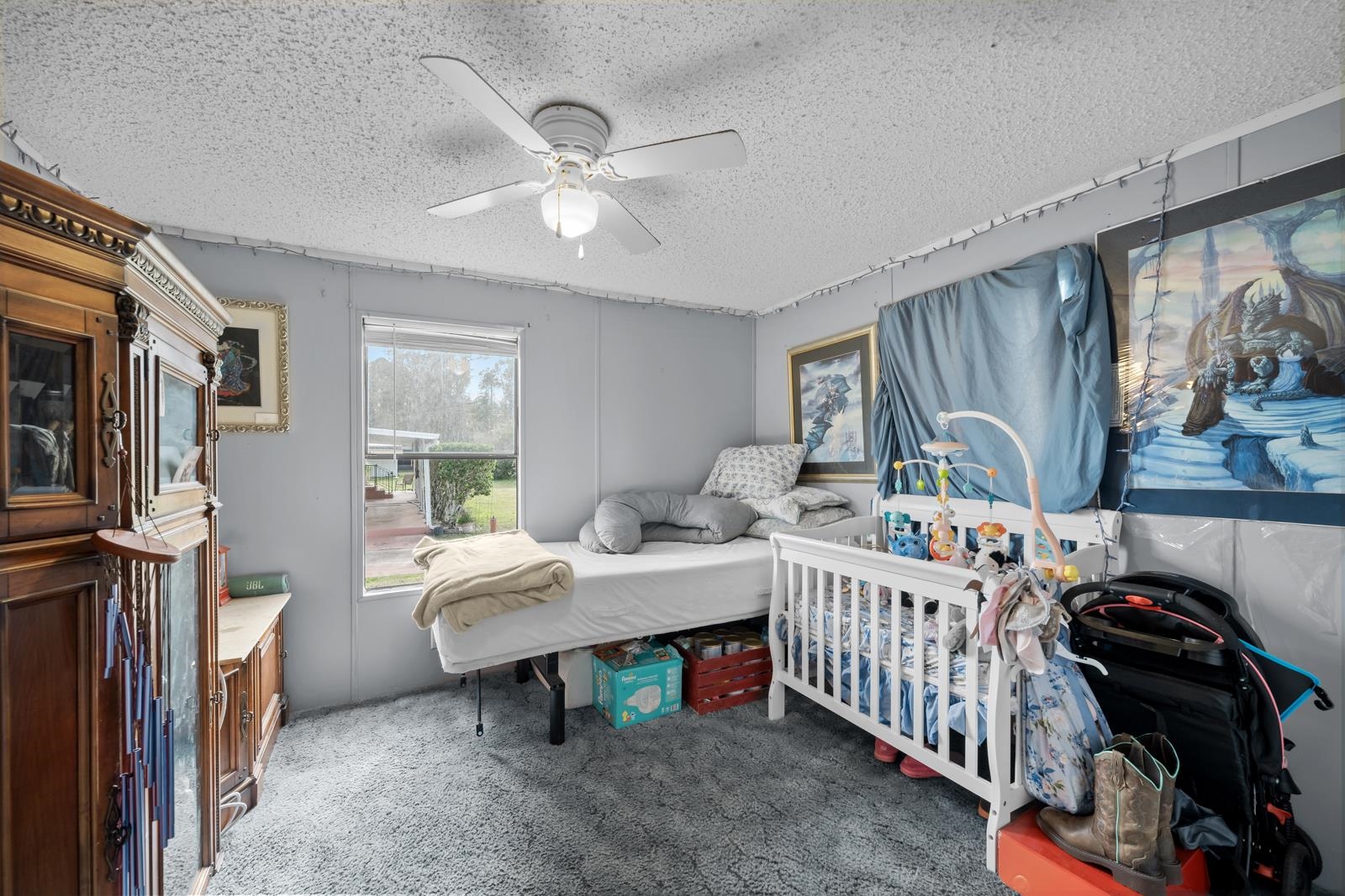 106 Lake Lane Crescent City, FL 32112 - Photo 11 of 25 a bedroom with furniture and a window