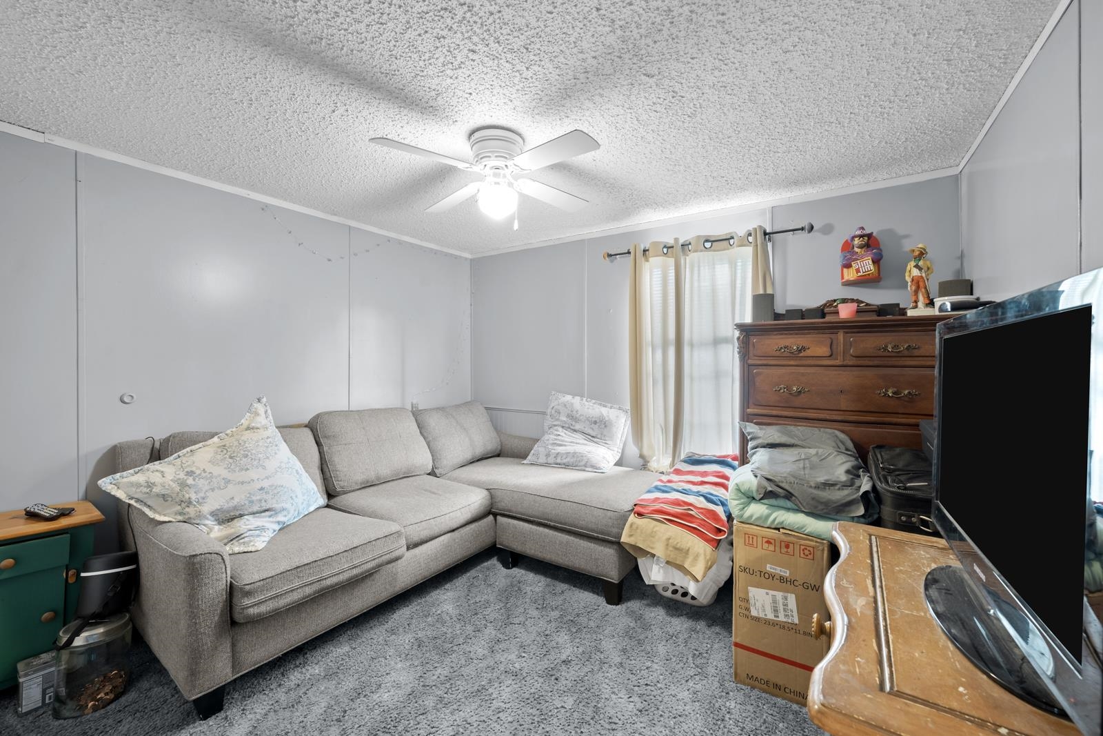 106 Lake Lane Crescent City, FL 32112 - Photo 12 of 25 a living room with furniture and a window
