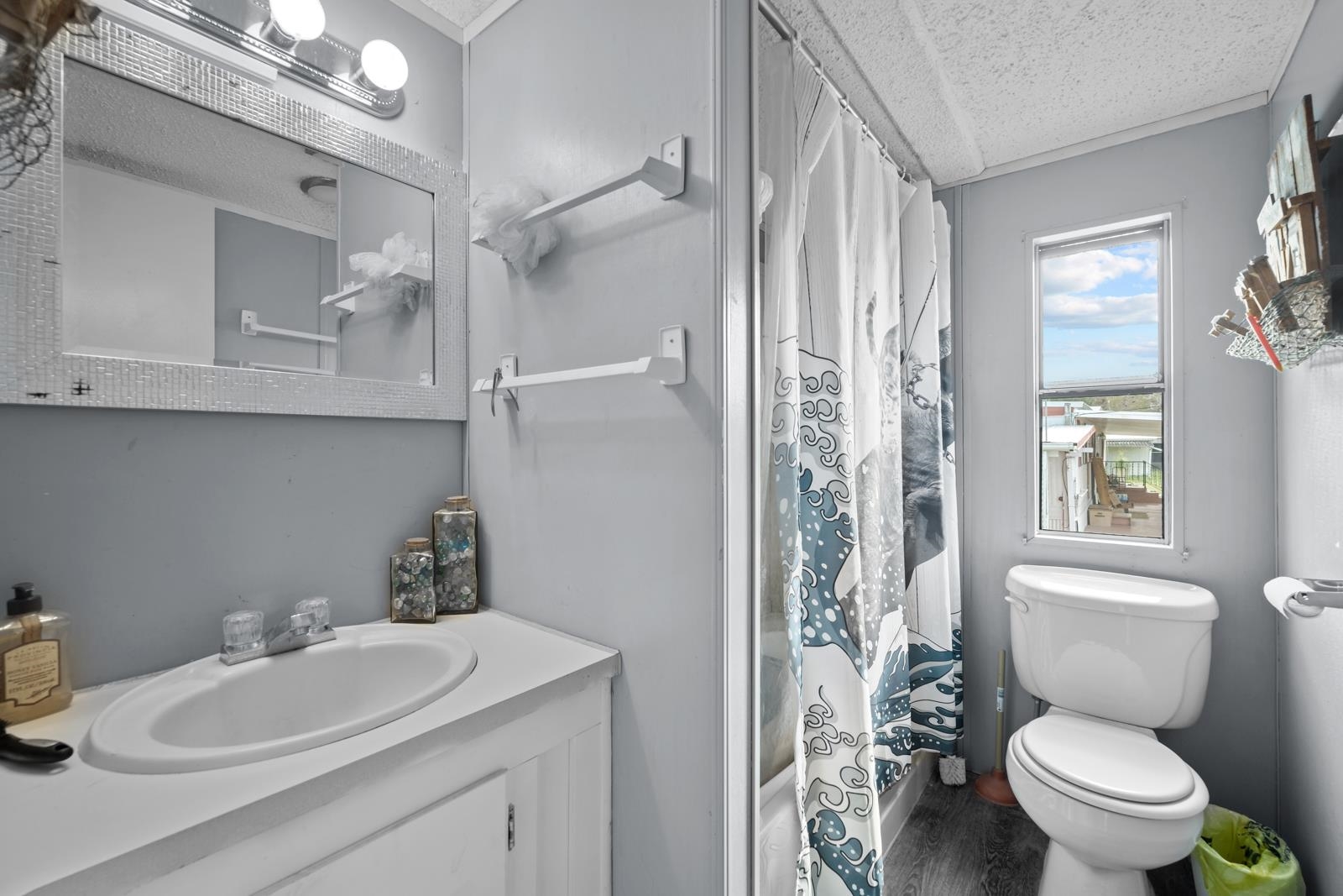 106 Lake Lane Crescent City, FL 32112 - Photo 13 of 25 a bathroom with a sink toilet vanity and shower