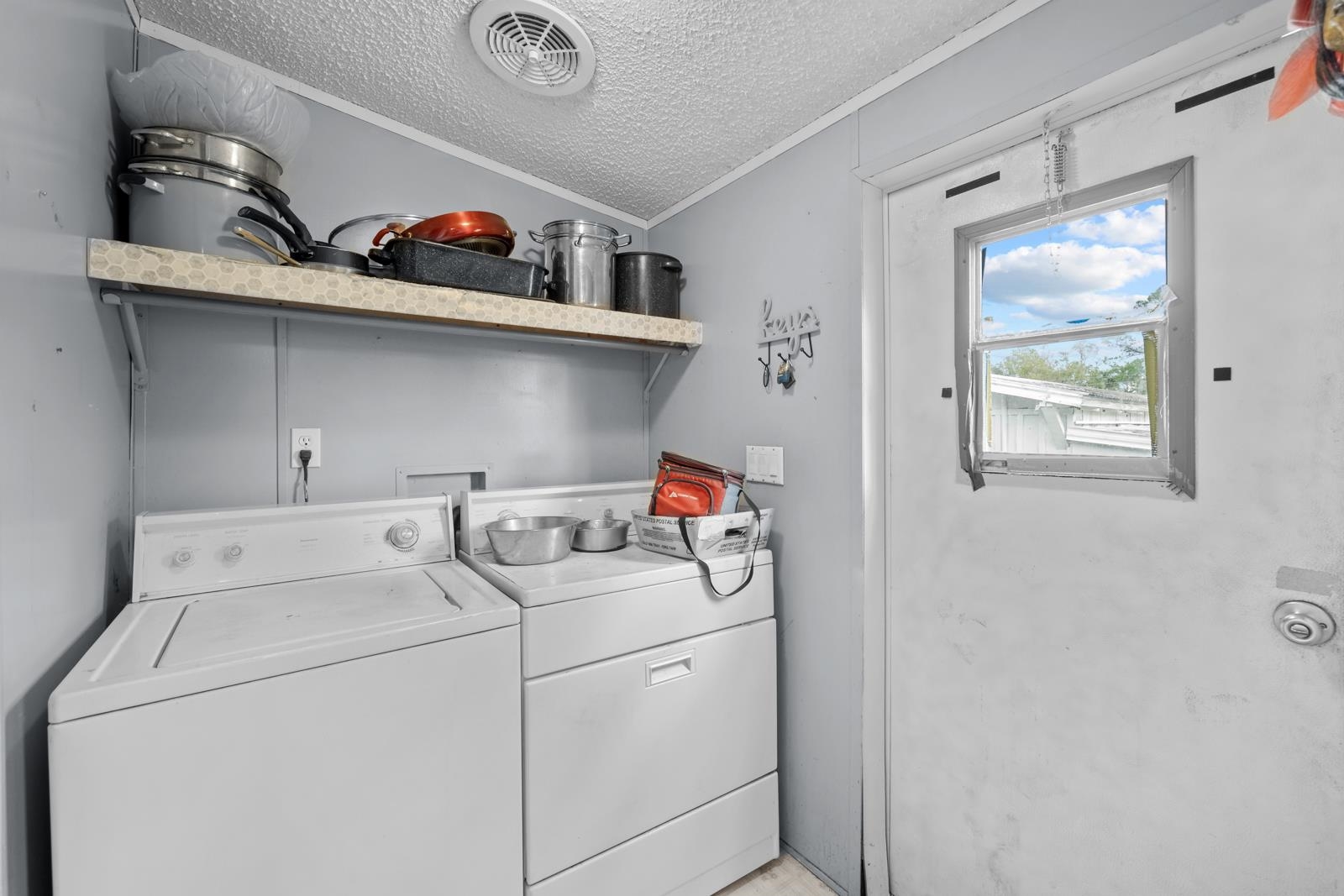 106 Lake Lane Crescent City, FL 32112 - Photo 14 of 25 a utility room with dryer and washer