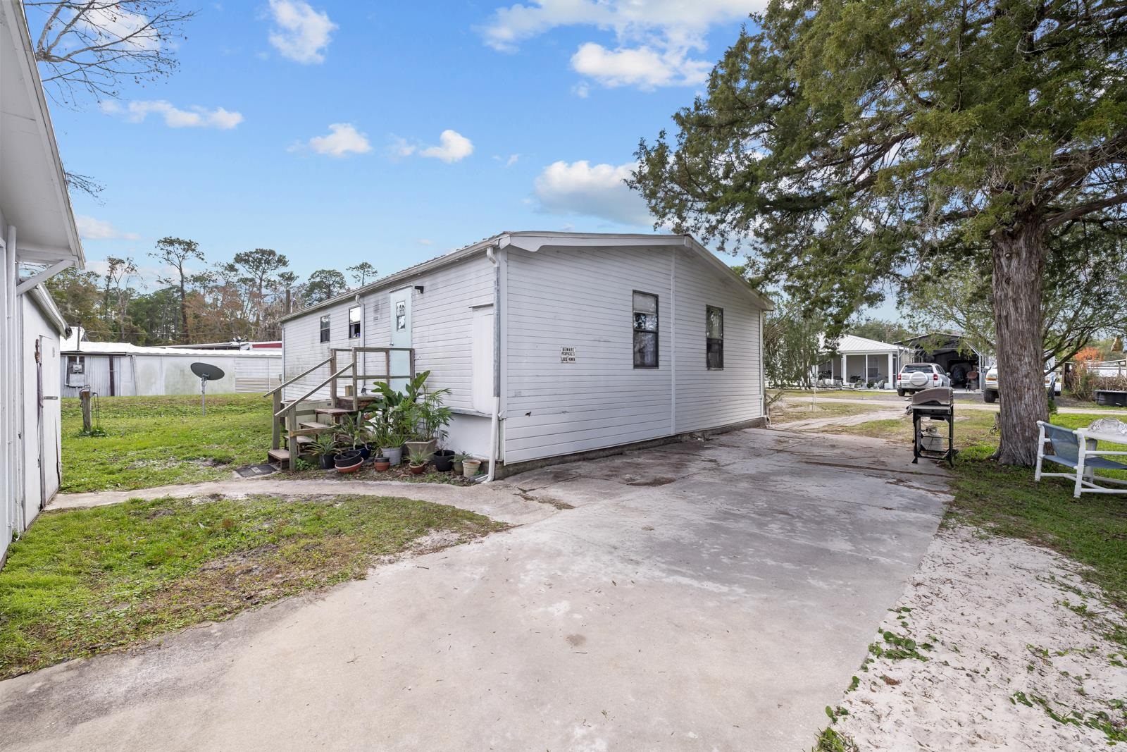 106 Lake Lane Crescent City, FL 32112 - Photo 15 of 25 a view of a house with a yard