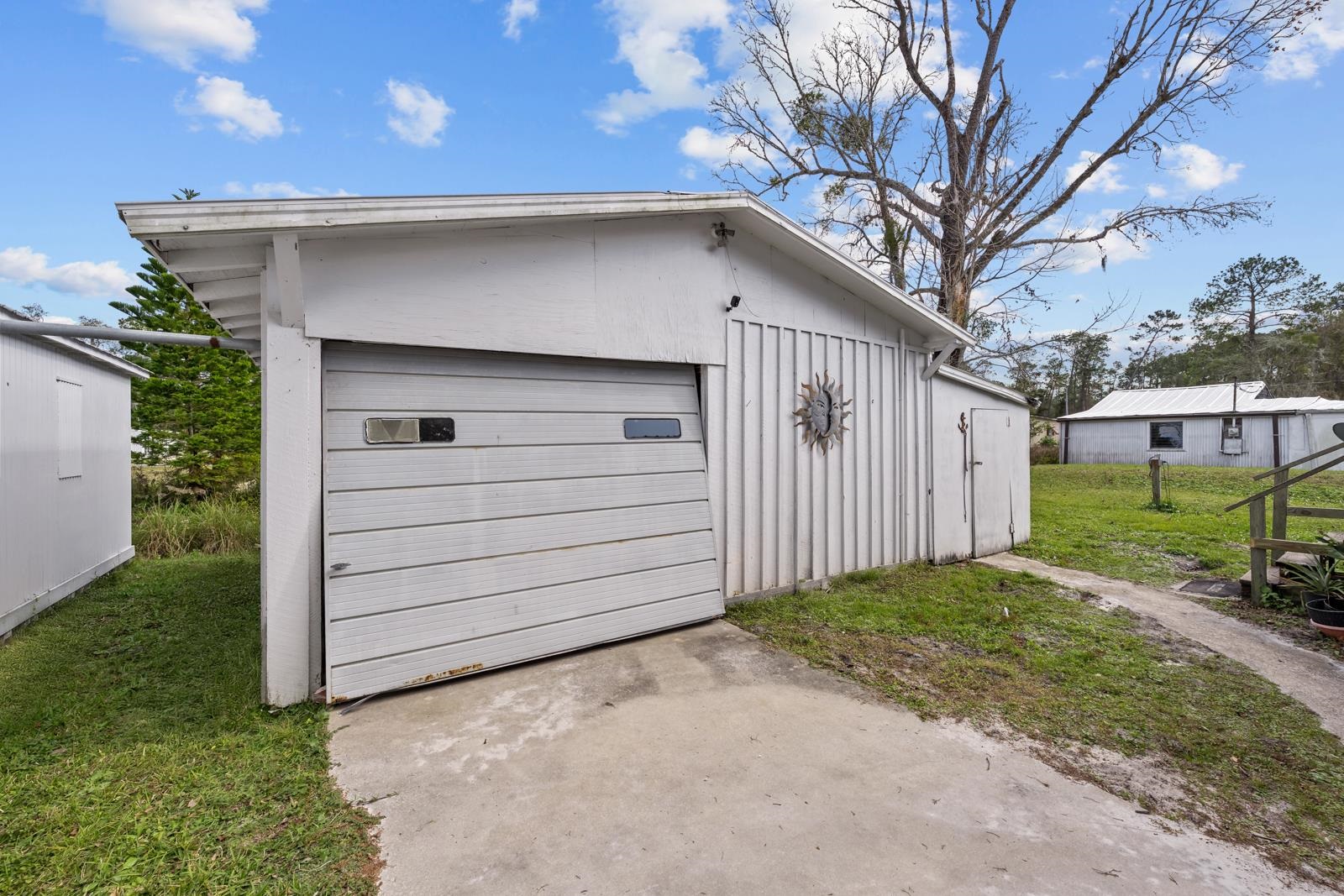 106 Lake Lane Crescent City, FL 32112 - Photo 16 of 25 a front view of a house with a yard