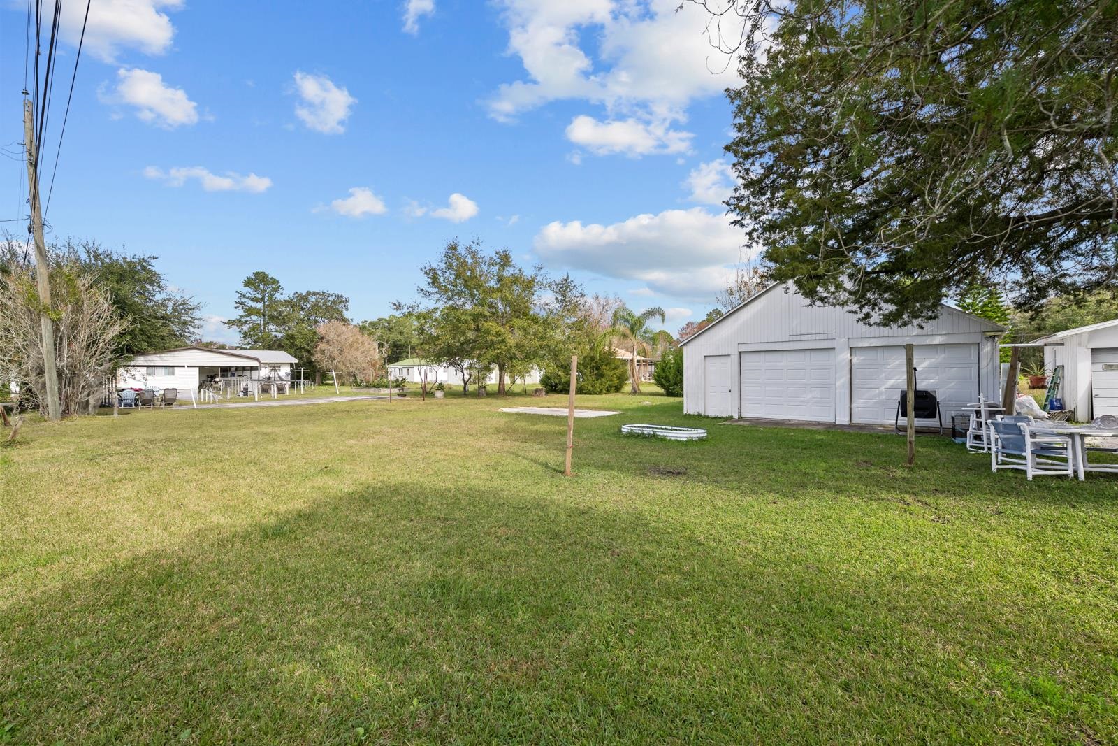 106 Lake Lane Crescent City, FL 32112 - Photo 19 of 25 a front view of a house with garden