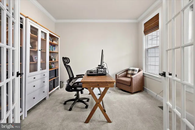 a view of a hallway with entryway