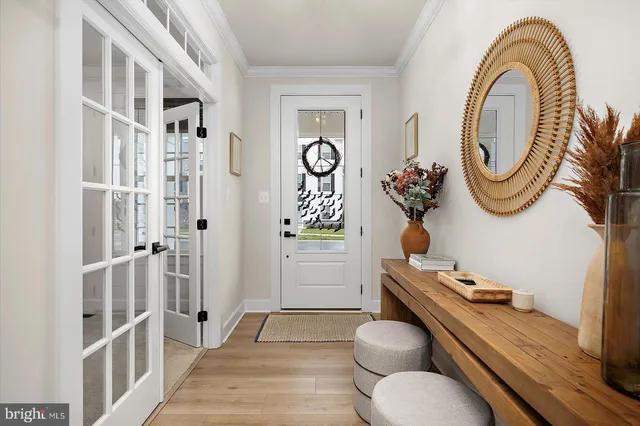 a bed room with a bed and a chair