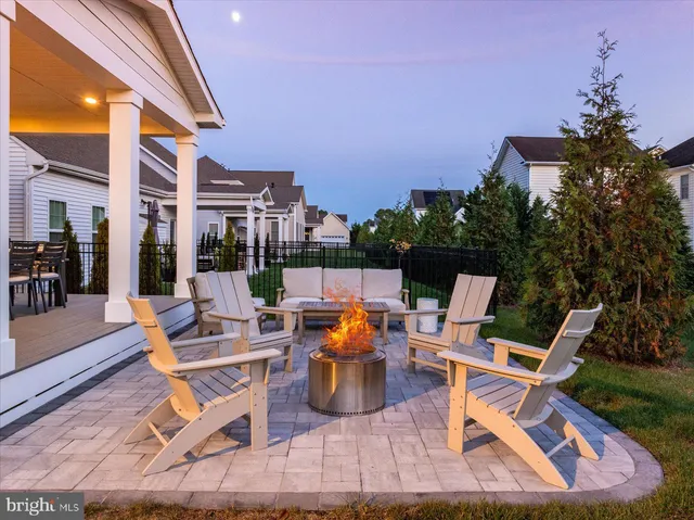 a room with pool table and windows