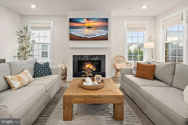 a view of a patio with table and chairs and potted plants